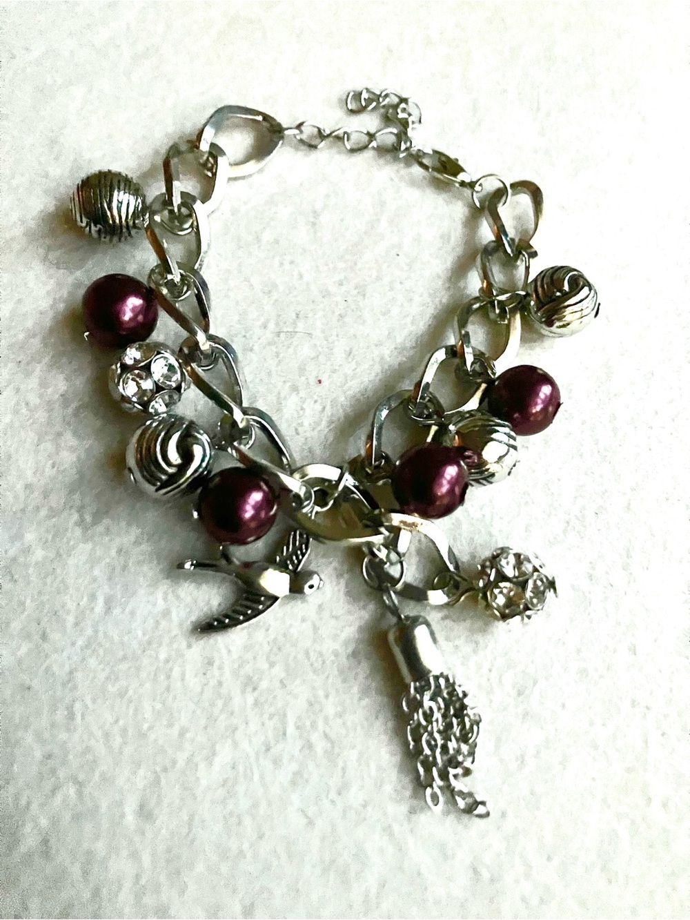 Purple pearls and silver dove charm bracelet